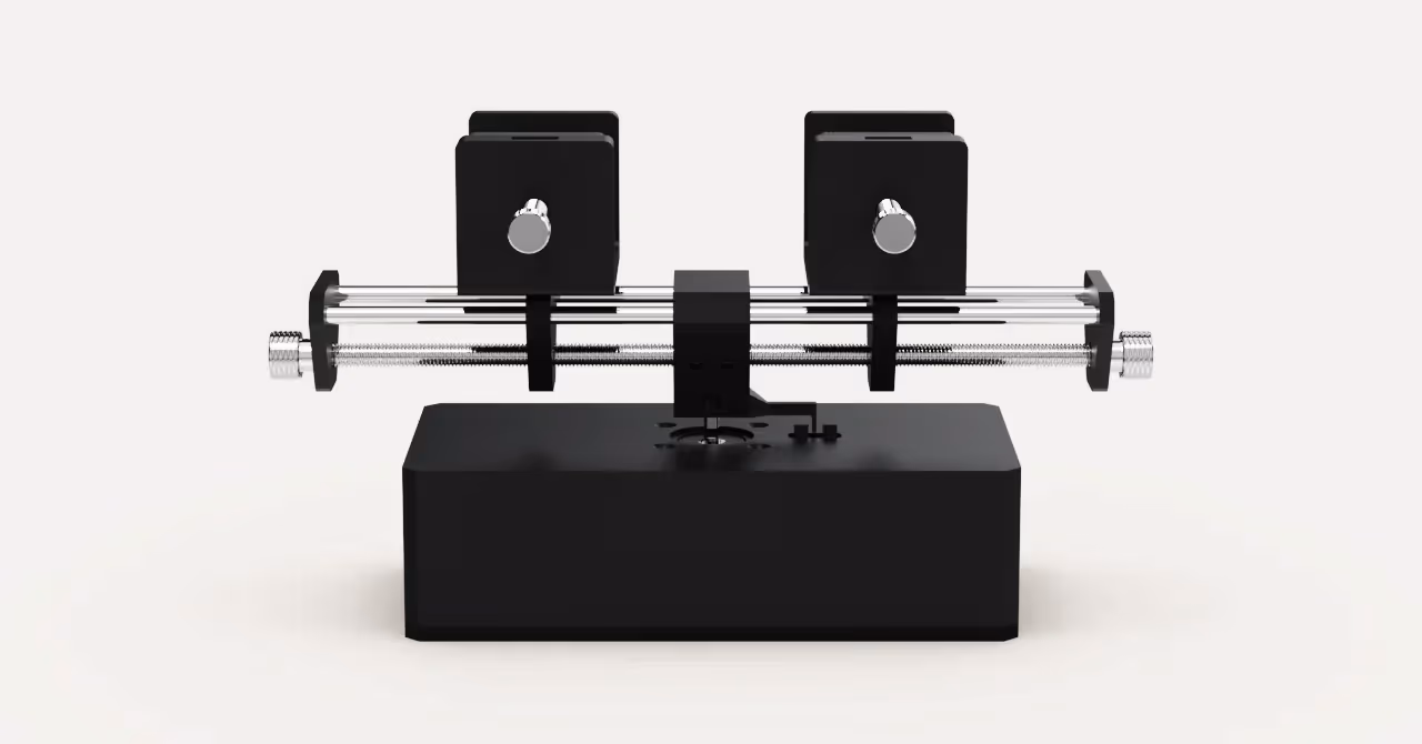 The camera rig - adjustable self-centering clamps on a fixed motion base